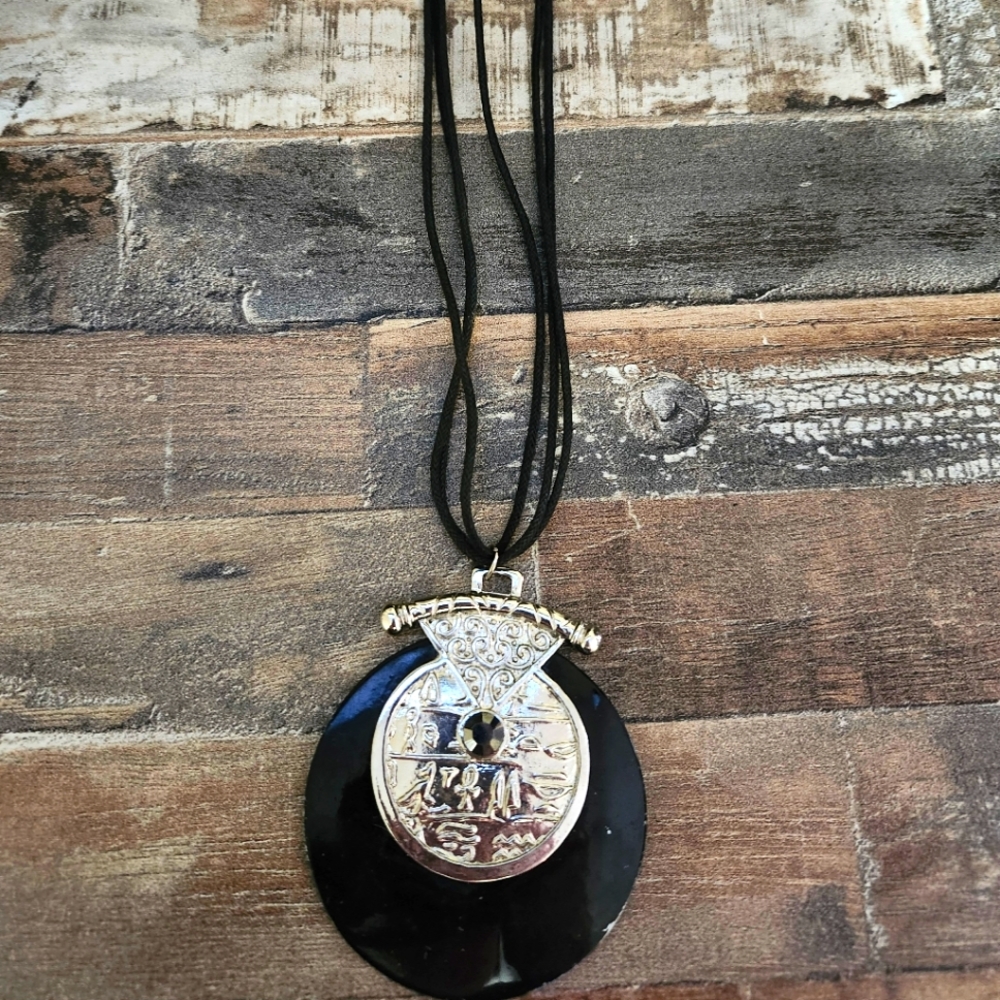 Nice Black and Silver Decorative Piece on Black Strands - Necklace